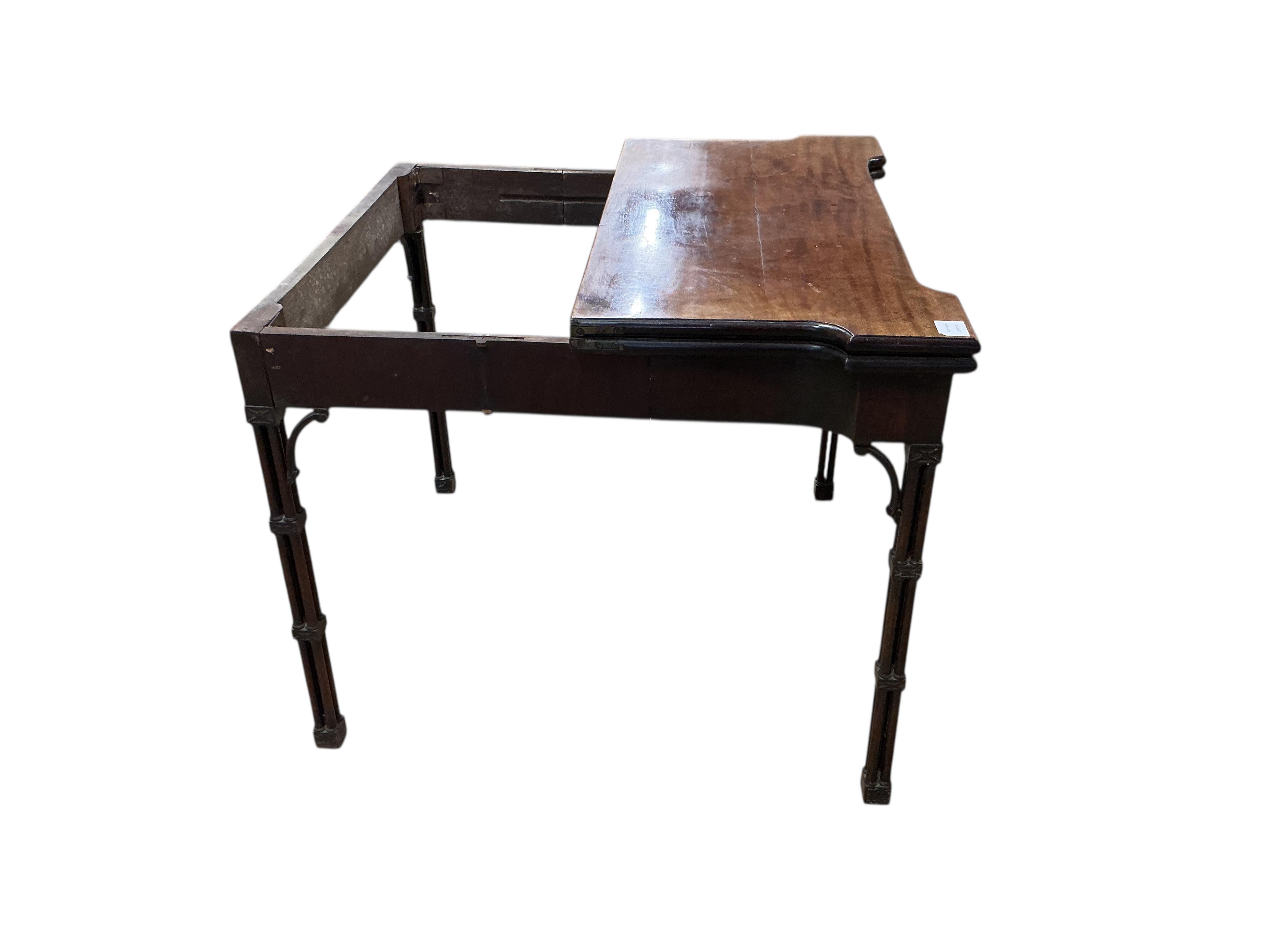 A George III Chippendale style mahogany folding card table on cluster column legs, width 90cm, depth 45cm, height 74cm